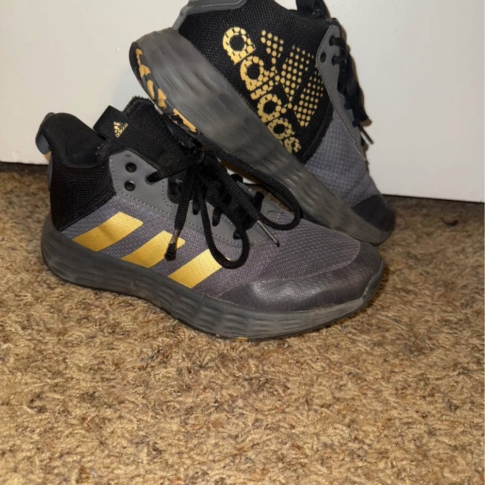 Adidas Gray and Black Shoes with Gold Stripes